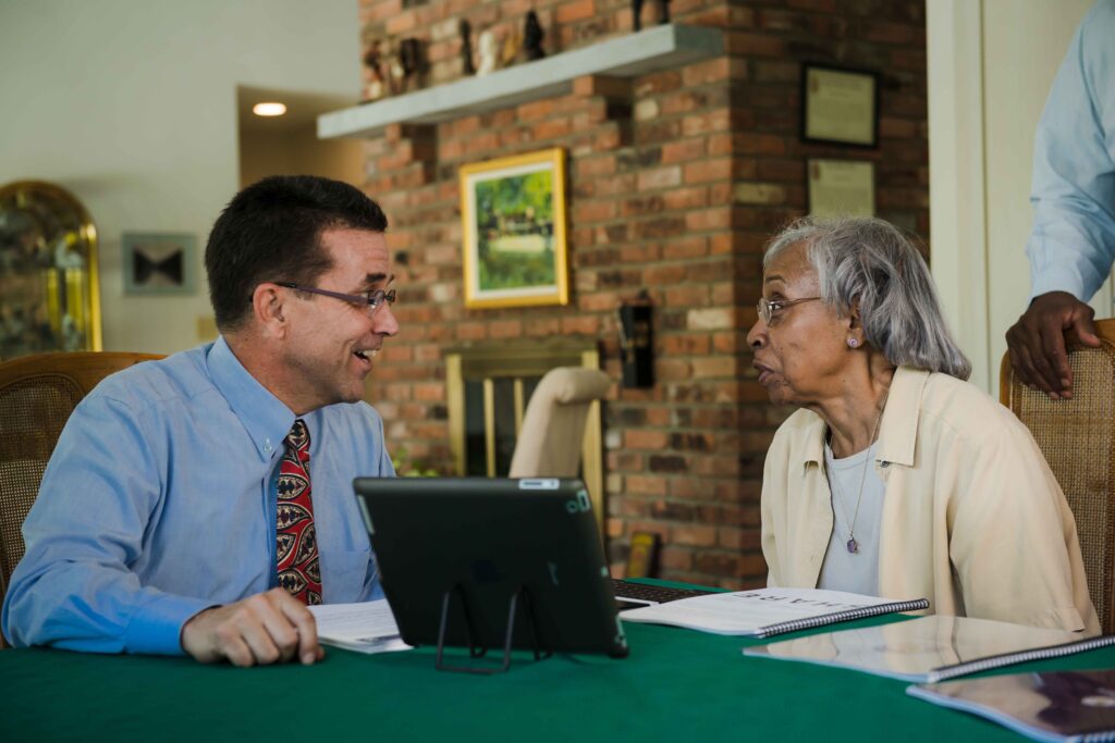 A SHARE counselor talking with a client